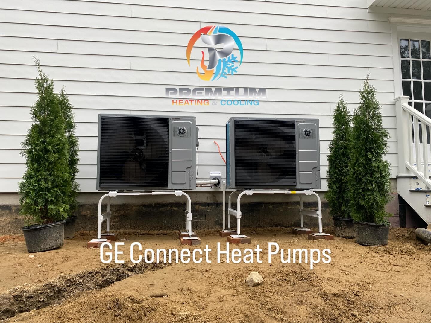Dual GE Connect heat pumps installed with landscaping