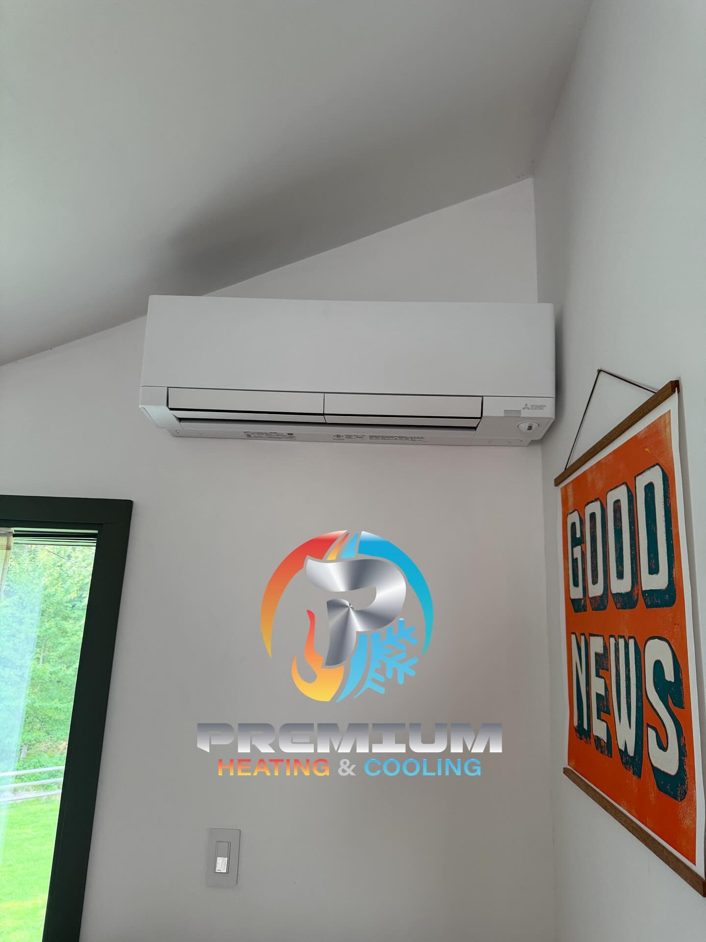 Mitsubishi mini-split indoor wall unit installed in room